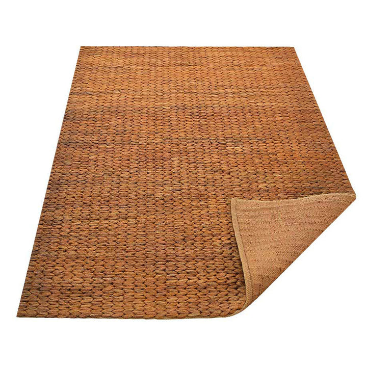 Golden Hand Woven Jute Rug for Warm Contemporary Interiors