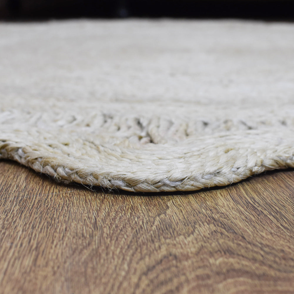 Round Oriental Jute Rug with Scalloped Border for Elegant Spaces