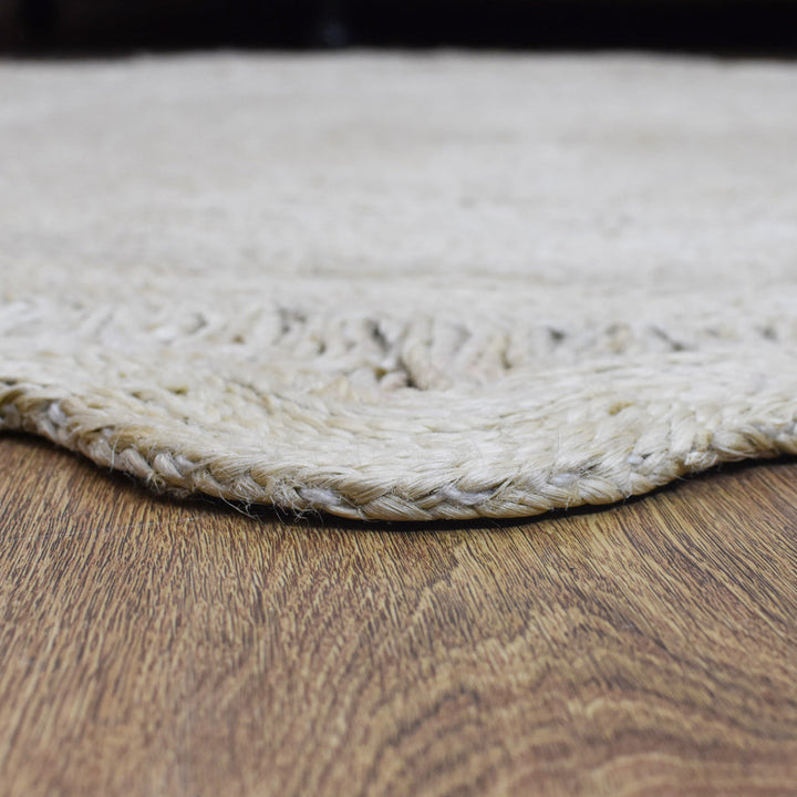 Round Oriental Jute Rug with Scalloped Border for Elegant Spaces