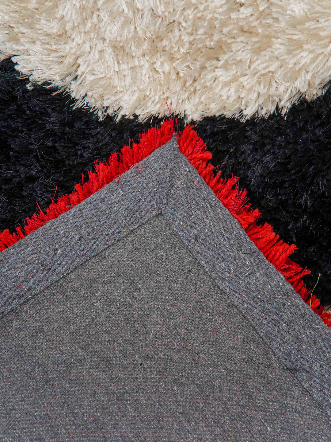 OrbitLuxe Hand Tufted Shag Polyester Geometric Rug