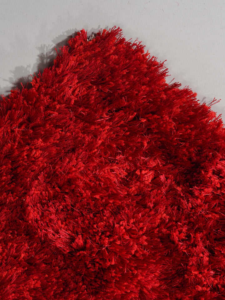 Vibrant Hand Tufted Shag Polyester Solid Rug