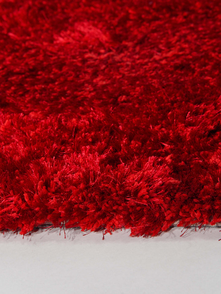 Vibrant Hand Tufted Shag Polyester Solid Rug