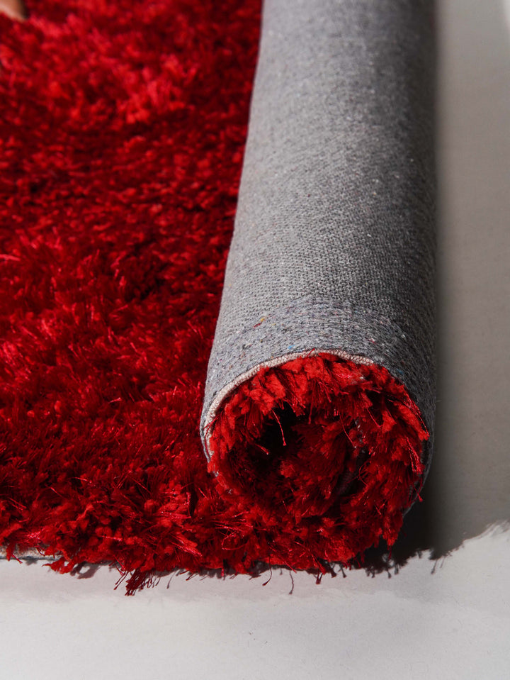 Vibrant Hand Tufted Shag Polyester Solid Rug