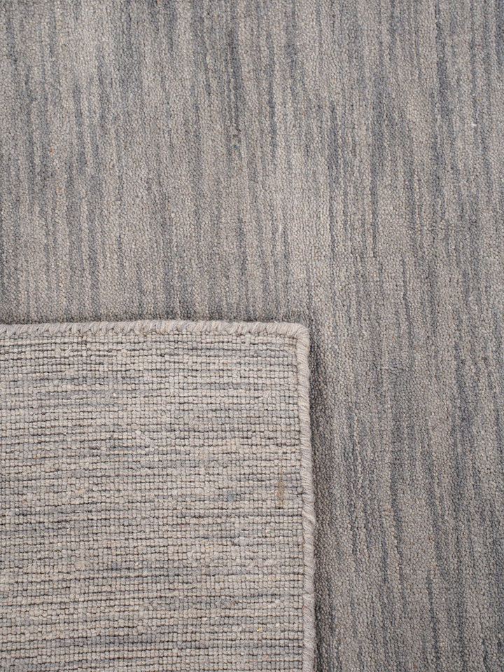 Solid Hand Knotted Wool Rug
