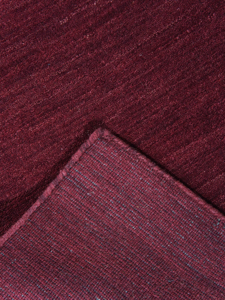 Solid Hand Knotted Wool Rug