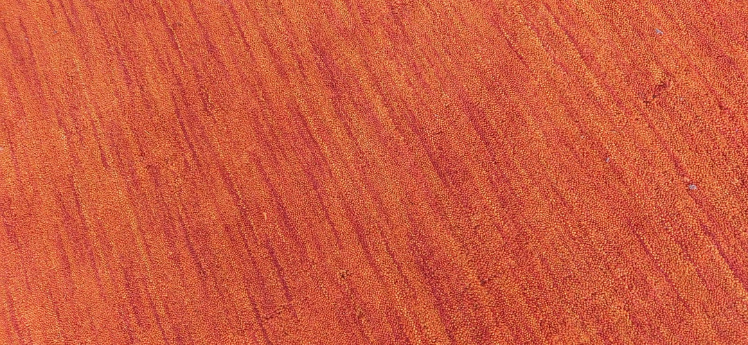 Light Red Solid Hand-Knotted Wool Rug
